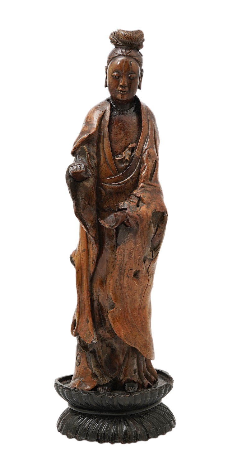 A Chinese rootwood standing figure of Guanyin, 18th/19th century